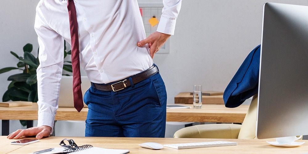 Man back pain at work