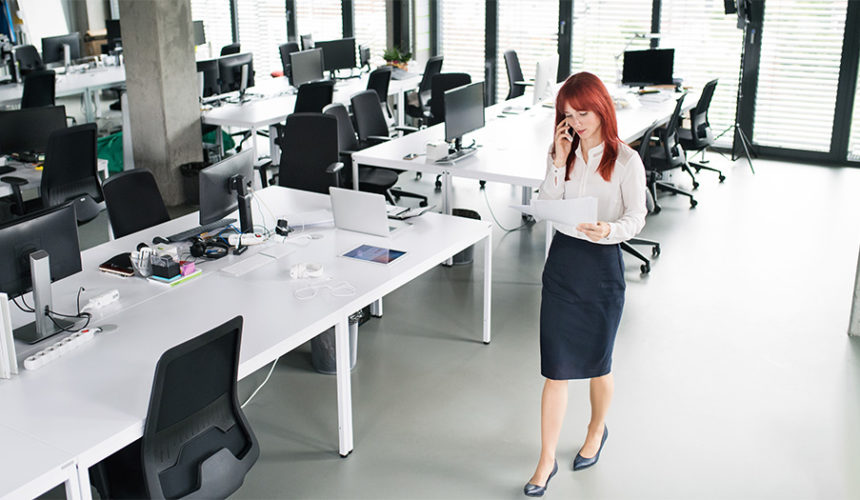 Managing summer stress Woman alone in an empty office