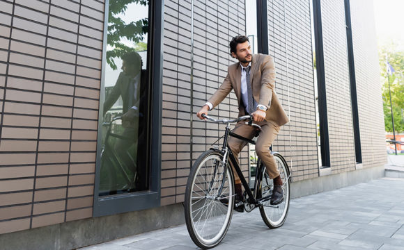 businessman riding a bicycle