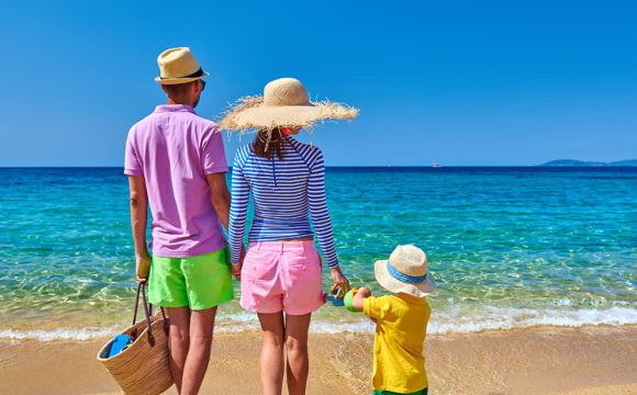 family in the sun on a beach