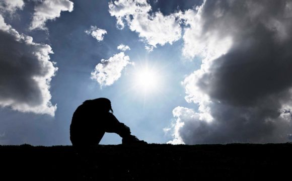 depressed person dark sky